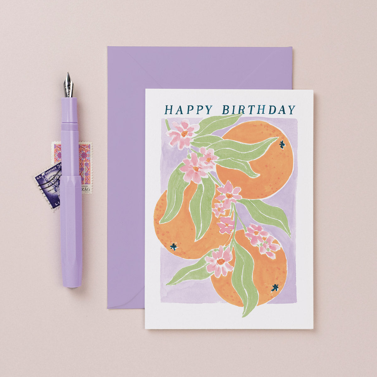 A stylish orange blossom illustration on a birthday card from the female birthday card collection at Sister Paper Co.