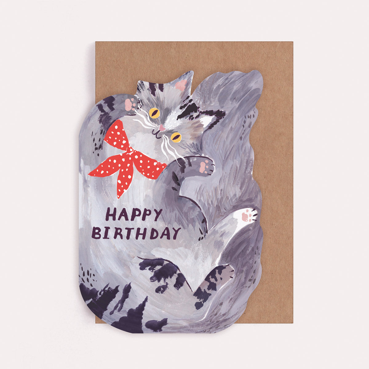 Cat-shaped cat lover birthday card with a cat lying on its back and the caption 'Happy Birthday'