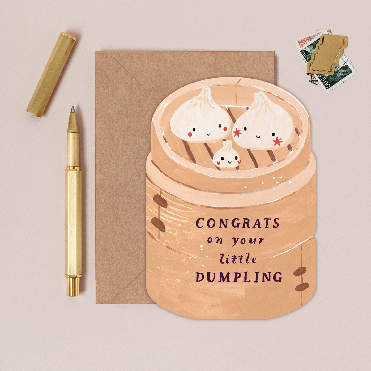 Dumpling new baby card design shown close up