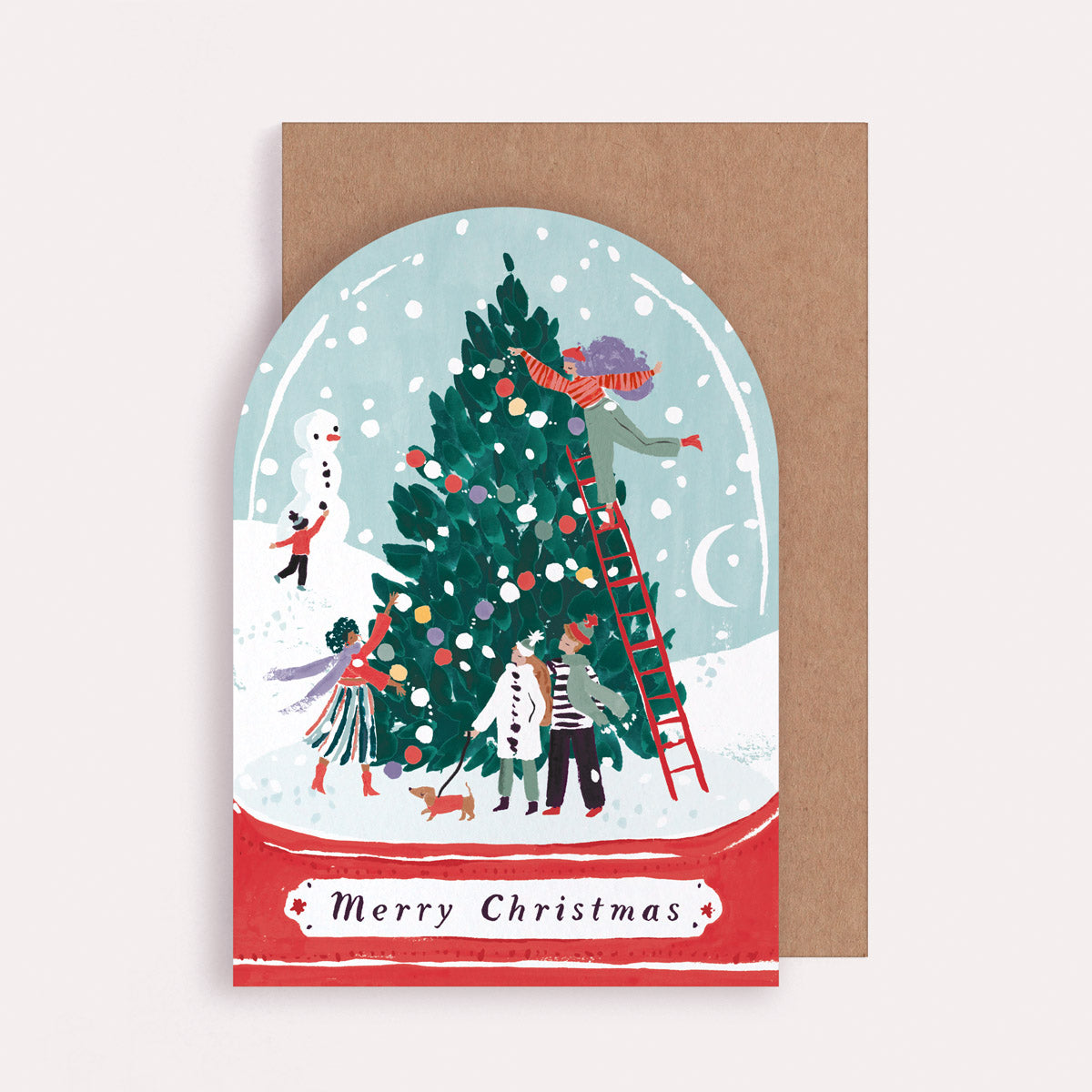 A Christmas card cut into the shape of a snow globe from the Christmas card collection at Sister Paper Co.