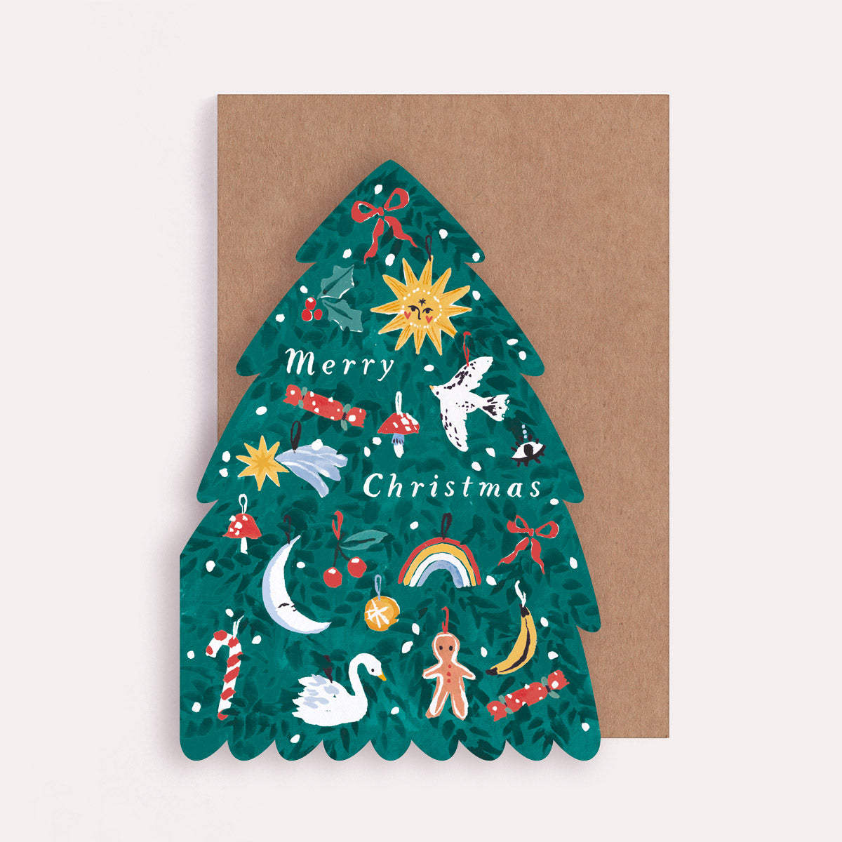 A Christmas card cut into the shape of a Christmas tree from the Christmas card collection at Sister Paper Co.