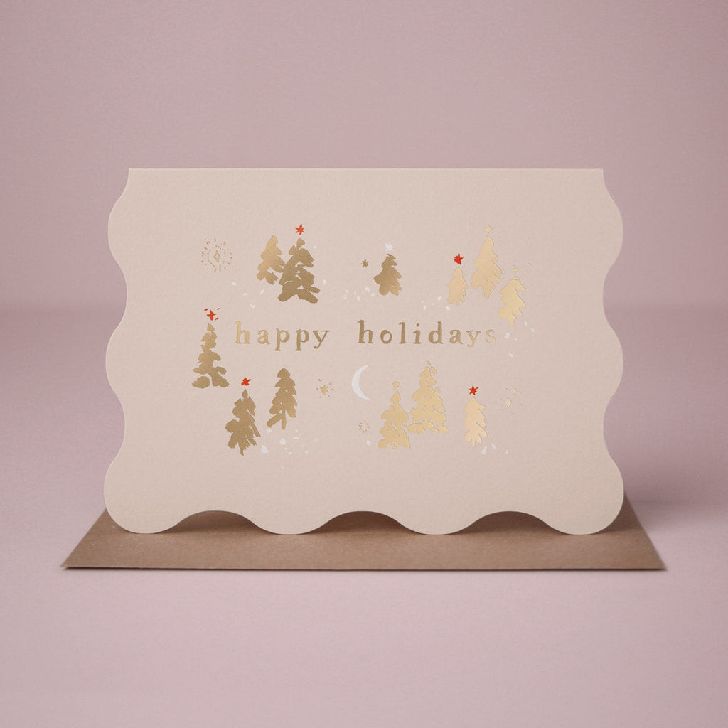 A wavy edge Christmas card with sparkly gold foil tree details from the Sister Paper Co. collection of Christmas cards.