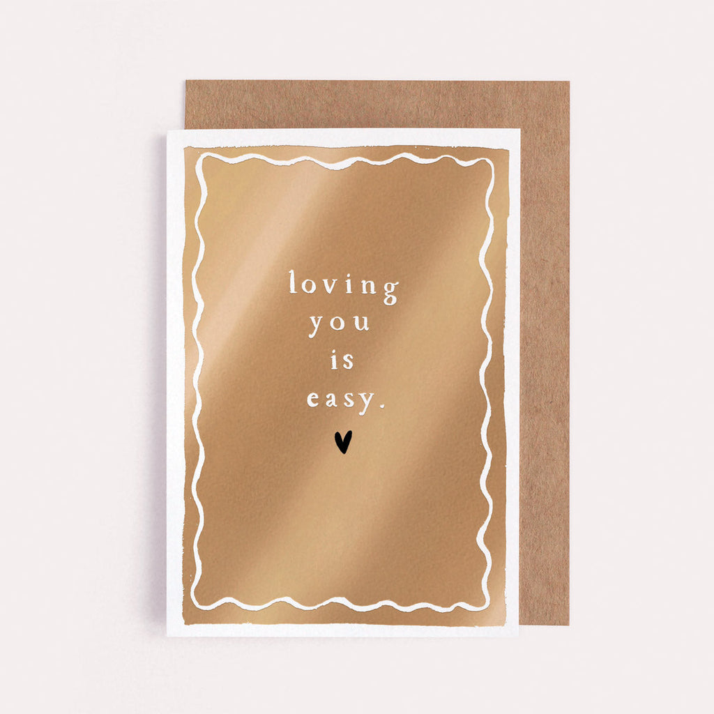 A love card with gold foil details from Sister Paper Co.