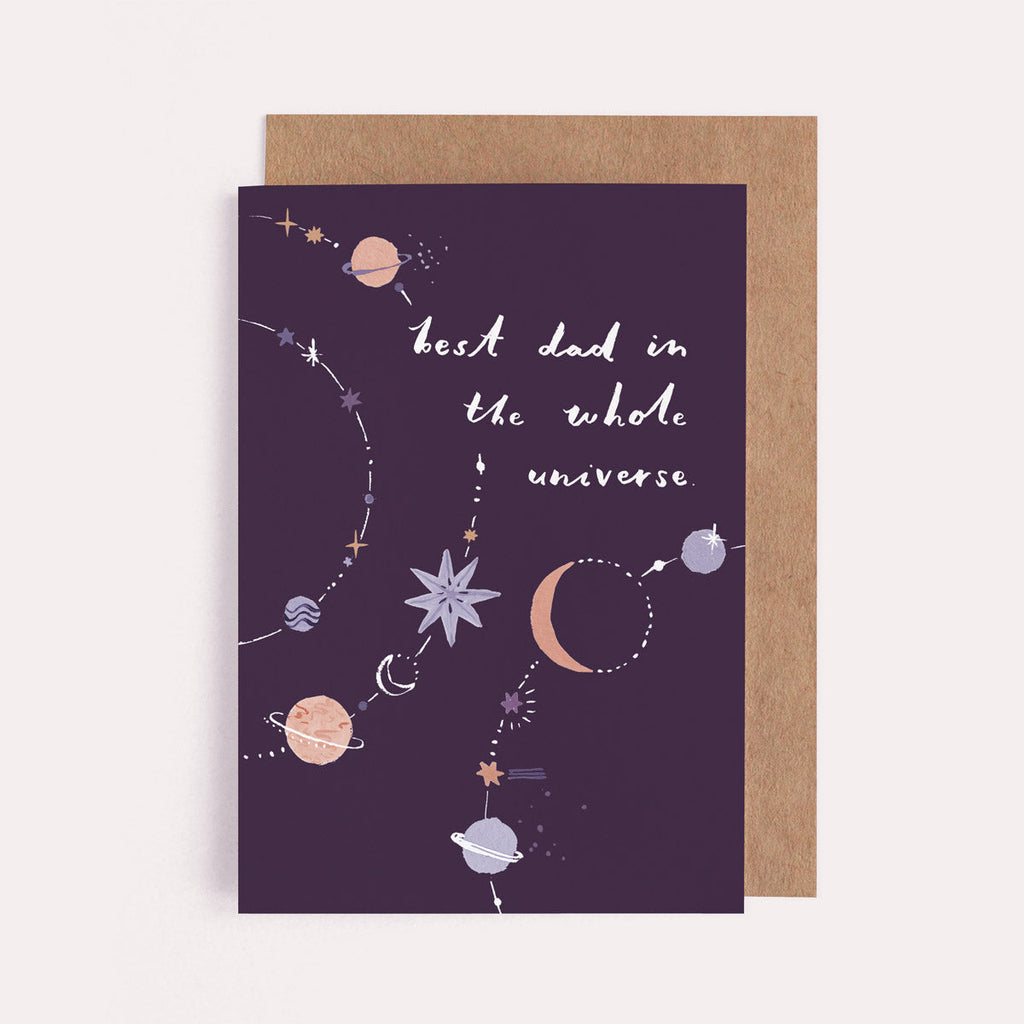 A hand painted dad card featuring a solar system of stars, moons and planets for the best dad in the universe. From the Solstice collection at Sister Paper Co.