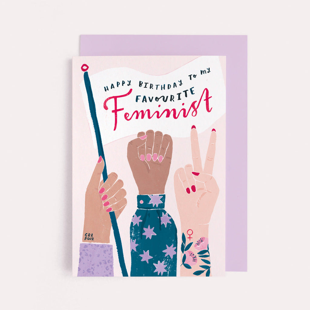A protest flag and women's march fists illustration on a birthday card from the feminist female birthday card collection at Sister Paper Co.