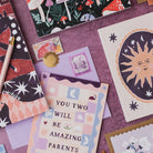 Amazing parents new baby card styled with props