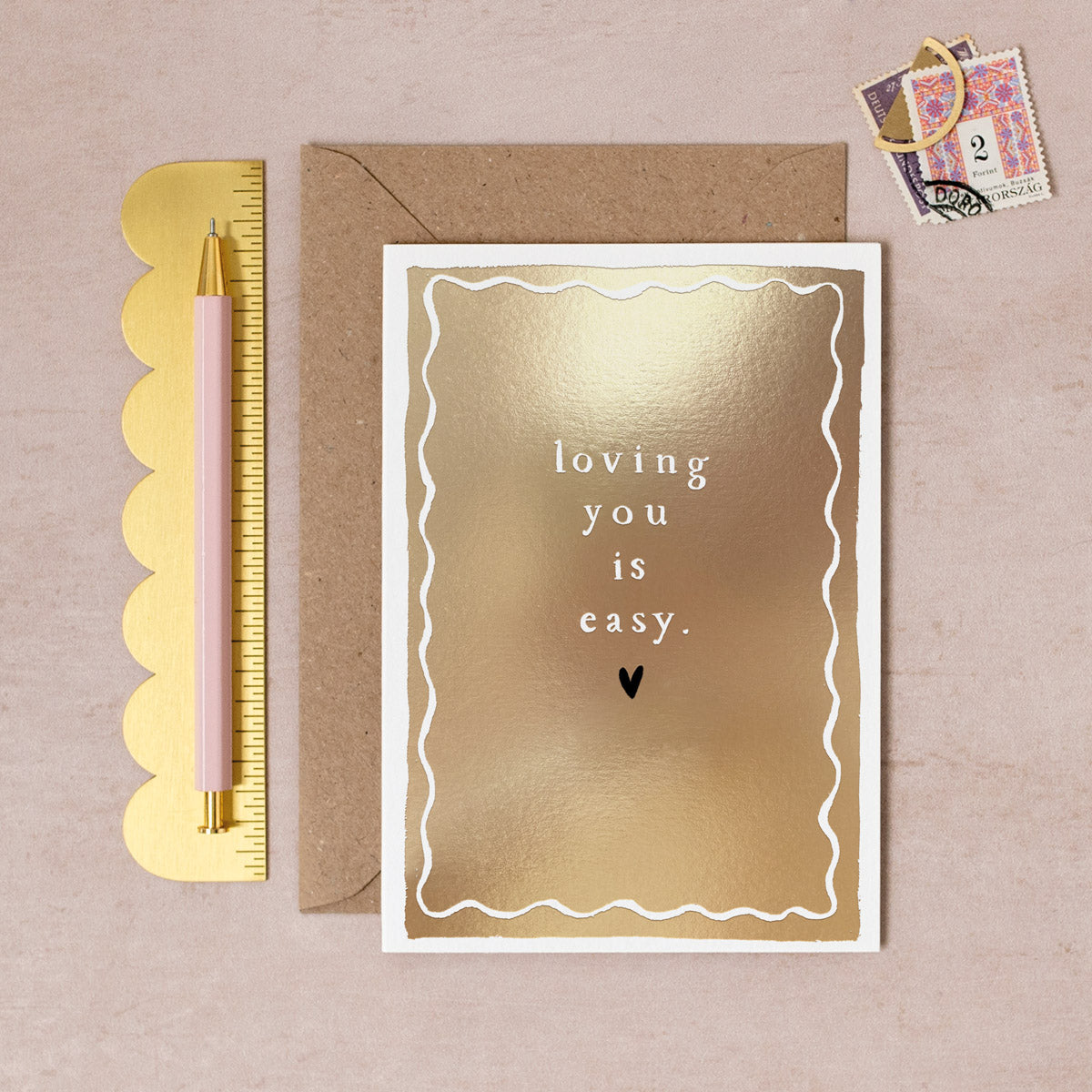 A love card with gold foil details from Sister Paper Co.