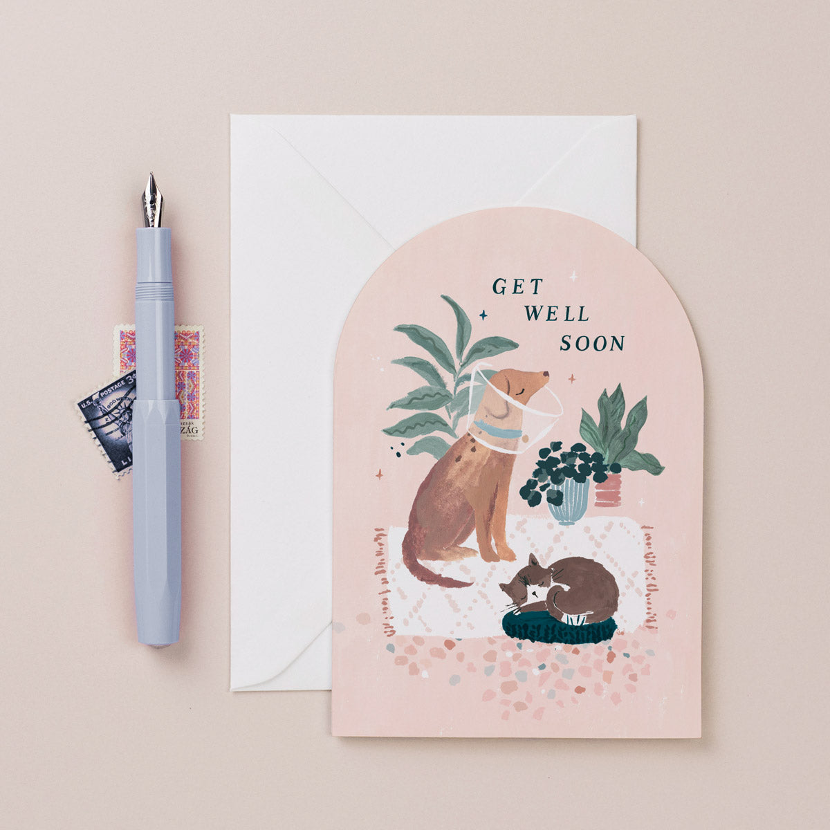 A get well soon card featuring an injured cat and dog from Sister Paper Co.