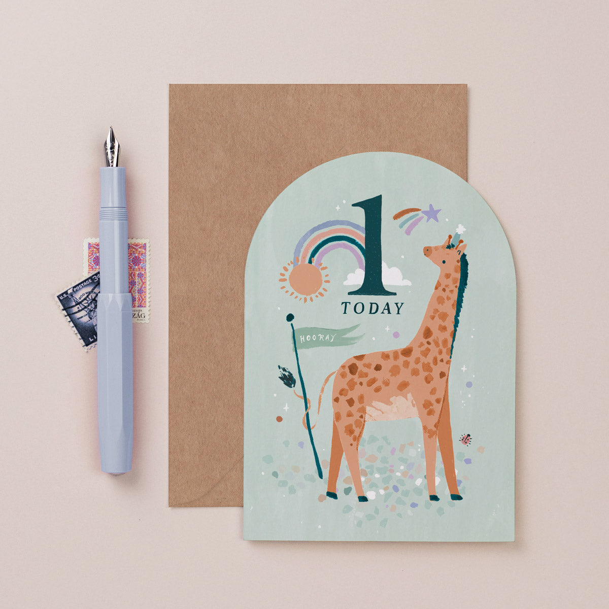 An age one birthday card featuring a giraffe from Sister Paper Co.