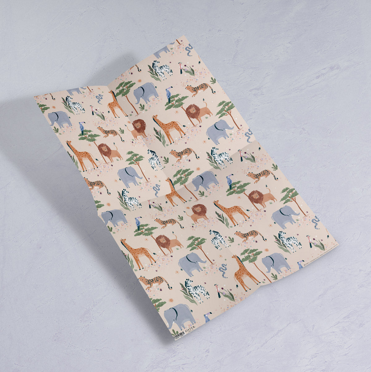 Safari animal print wrapping paper from the Kids gift wrap collection at Sister Paper Co.