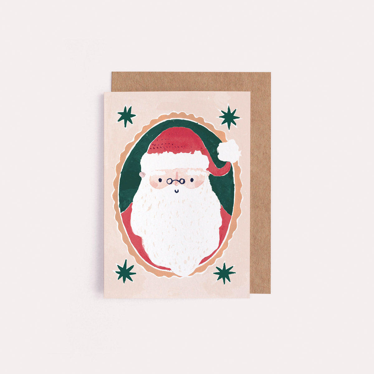 A mini Christmas card with an illustrated festive santa from the mini Christmas card collection at Sister Paper Co.
