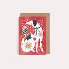 A mini Christmas card with an illustrated dog from the mini Christmas card collection at Sister Paper Co.