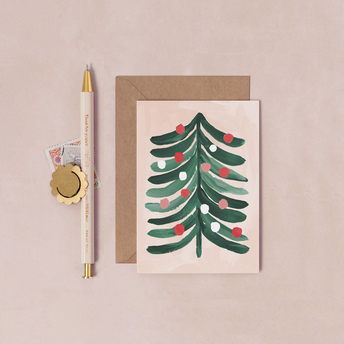 A mini Christmas card with an illustrated Christmas tree from the mini Christmas card collection at Sister Paper Co.