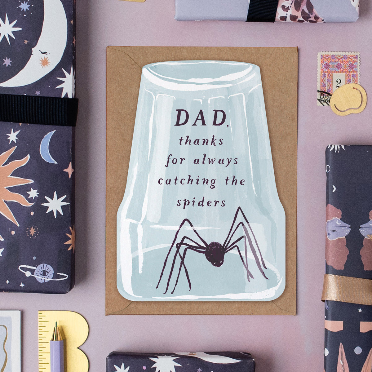 Funny Father's day card with an upturned glass trapping a spider with the caption 'thanks for catching all the spiders'