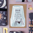 Funny Father's day card with an upturned glass trapping a spider with the caption 'thanks for catching all the spiders'
