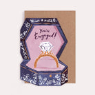 Ring box shaped engagement and congratulations card with a diamond ring and the caption 'You're Engaged!'