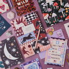 Sister Paper Co cards, notebooks and pocket notebooks styled together