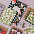 Sister Paper Co cards, notebooks and gift wrap styled together