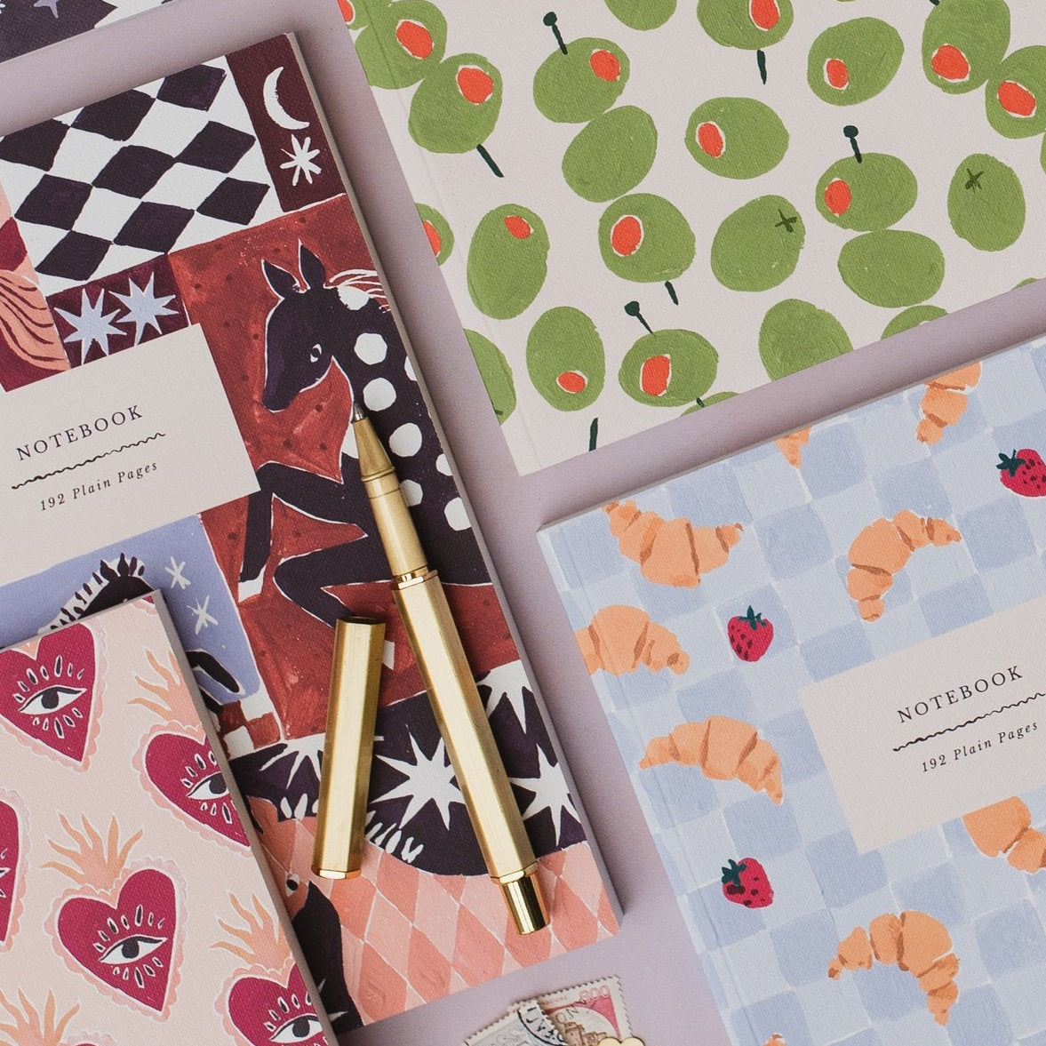 Sister Paper Co notebooks and pocket notebooks in a flat lay