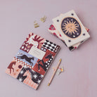 Sister Paper Co notebooks and pocket notebooks in a flat lay