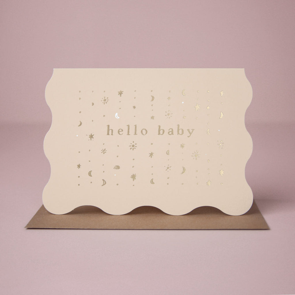 A new baby card featuring luxe stamped gold foil details from the Cosmique range of greeting cards from Sister Paper Co.