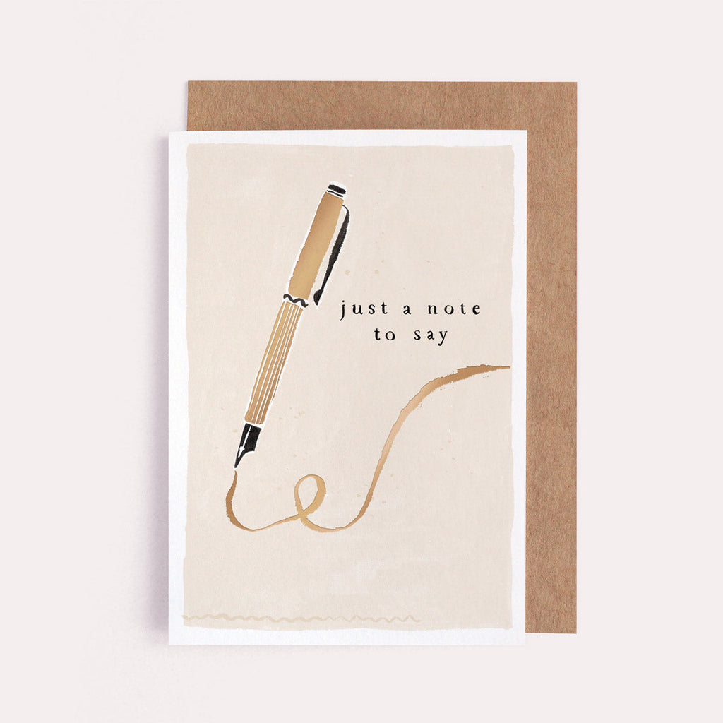 A greeting card with fountain pen artwork and with gold foil details from Sister Paper Co.