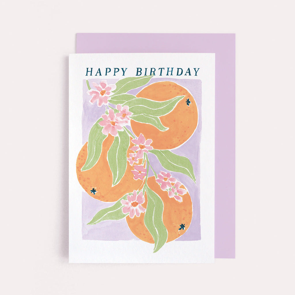 A stylish orange blossom illustration on a birthday card from the female birthday card collection at Sister Paper Co.