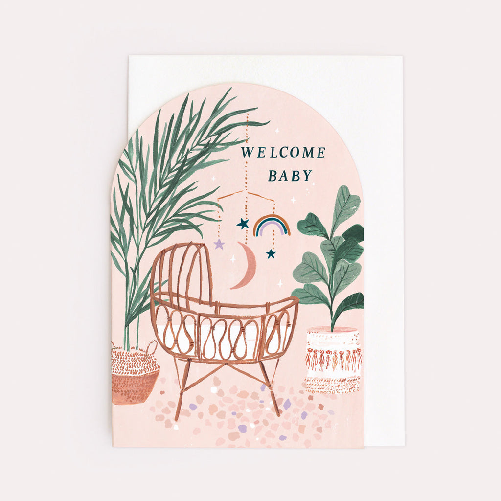 A gender neutral baby card with illustrated bamboo crib and hand lettering on a new baby card from the unisex baby collection at Sister Paper Co.