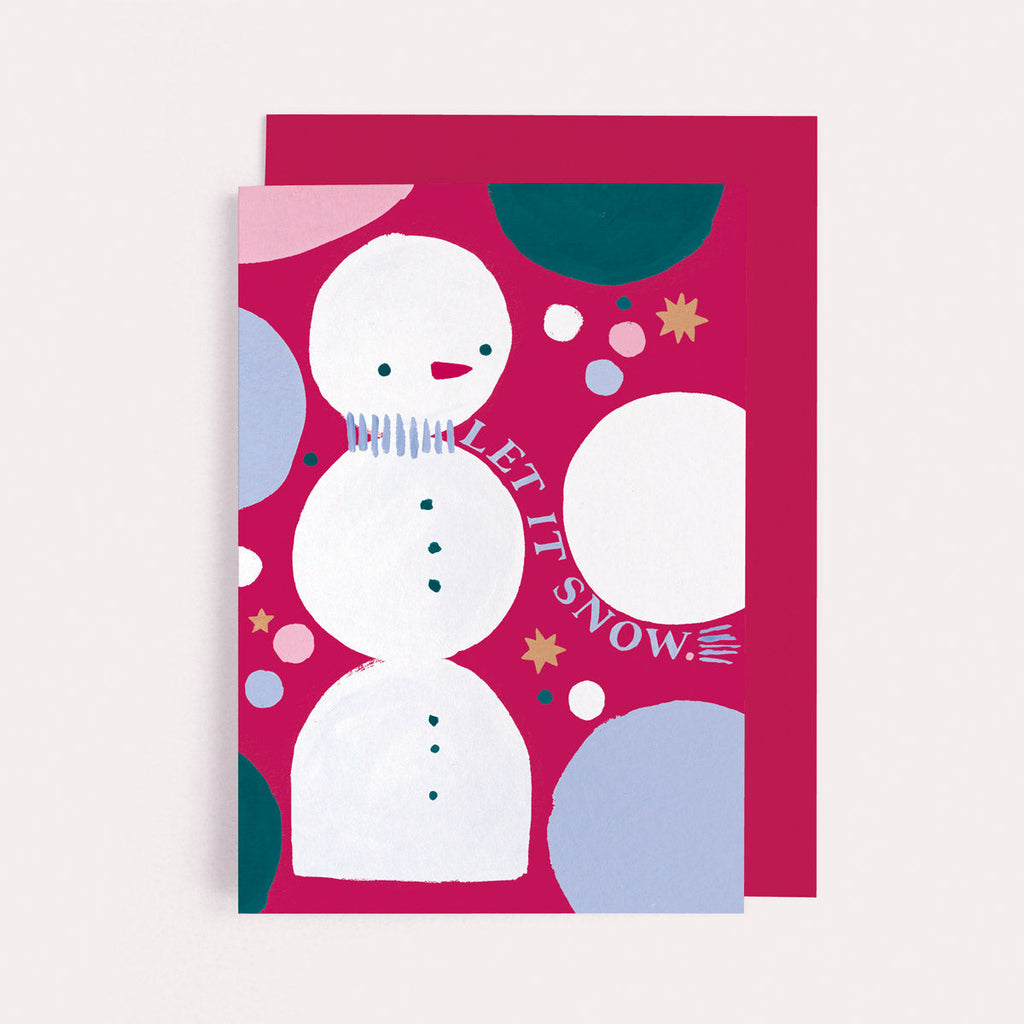 A jolly snowman and rainbow dots on a Christmas card from the colourful, rainbow Christmas card collection at Sister Paper Co.