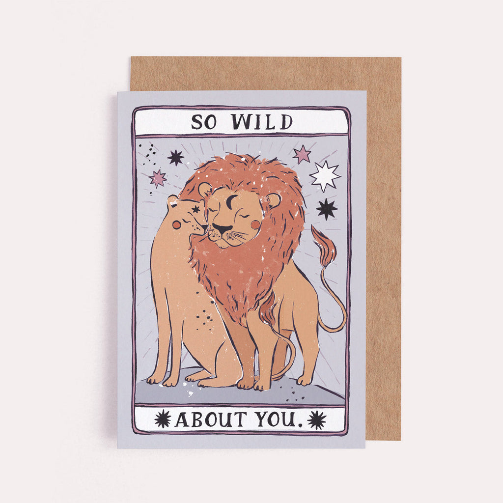 A male and female lion show their love with pride on this illustrated love and anniversary card inspired by the Tarot. From the love and occasion collection at Sister Paper Co.